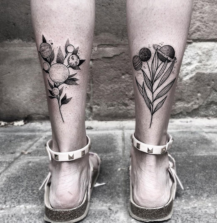Planet flowers leg tattoos