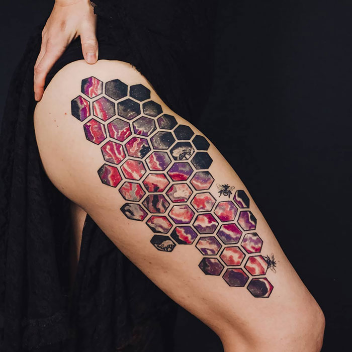 Geometrical with space and honey comb leg tattoo