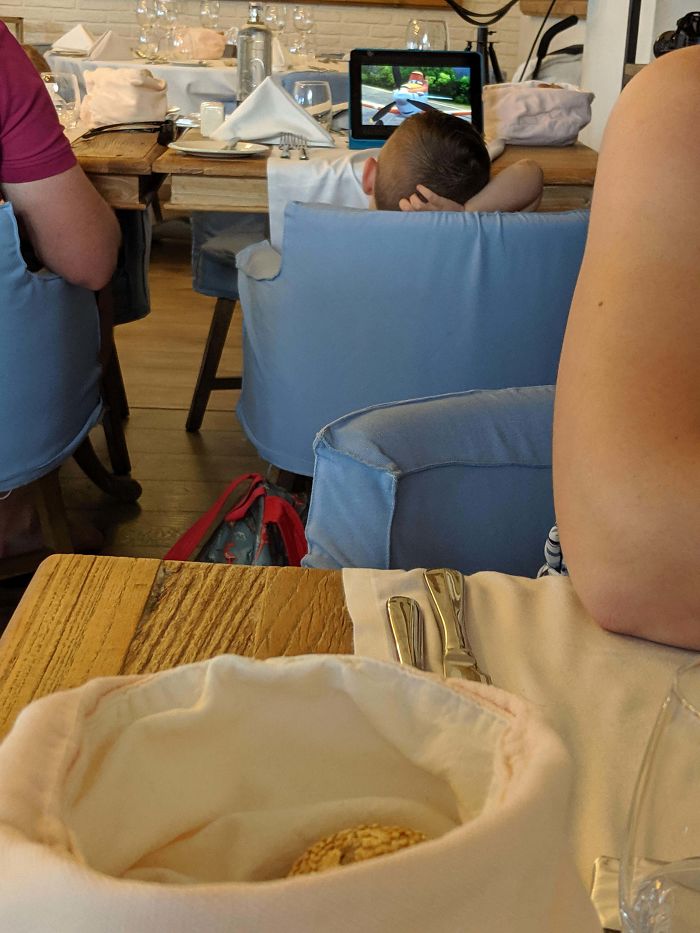 Letting Your Kid Watch A Movie On Full Volume In A Restaurant