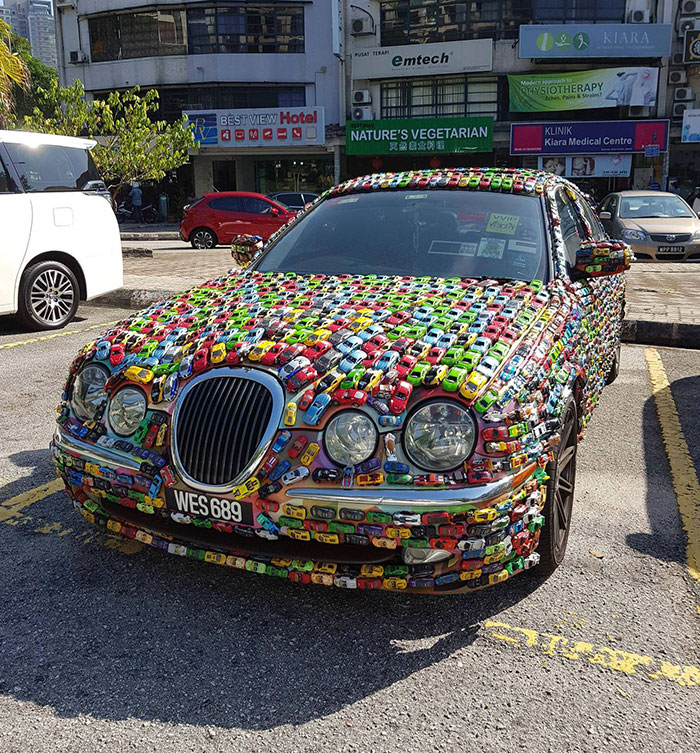Car Covered In Hot Wheels