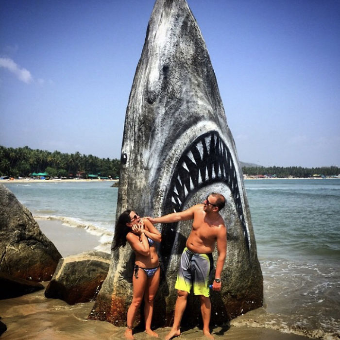 Graffiti Artist Turns A Beach Stone Into A Great White Shark And People Post Their Best Pics With It