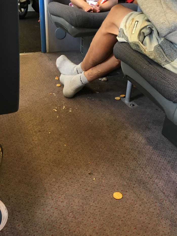 Trashy Dad, Letting Baby Drop Food On The Train Floor, Then Stepping On It Himself In His Socks. Witnessed Near Birmingham (UK)
