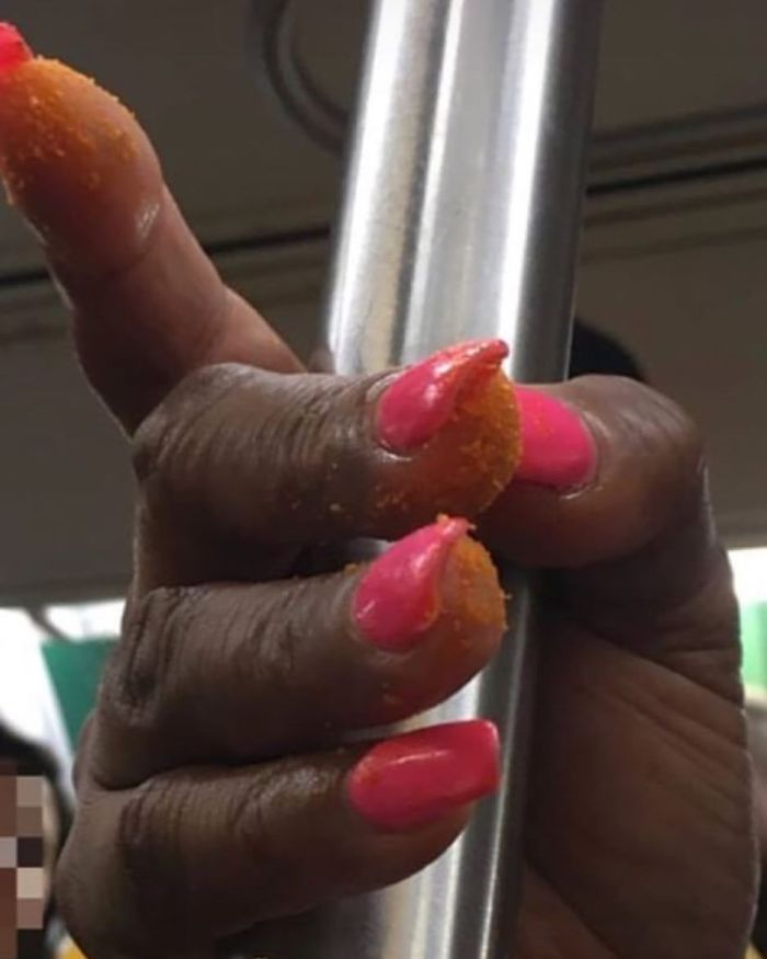 Making A Strong Case For Using Chopsticks With Cheetos In The Subway Right Now
