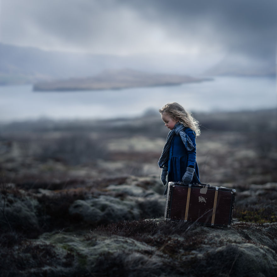 Iceland- A Local Girl Standing In A Typical Icelandic Landscape