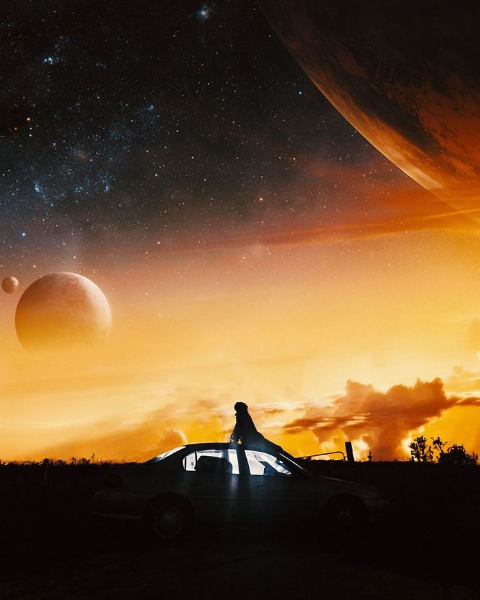 Dreamlike atmosphere with a person on a car under surreal planets in a glowing sky.