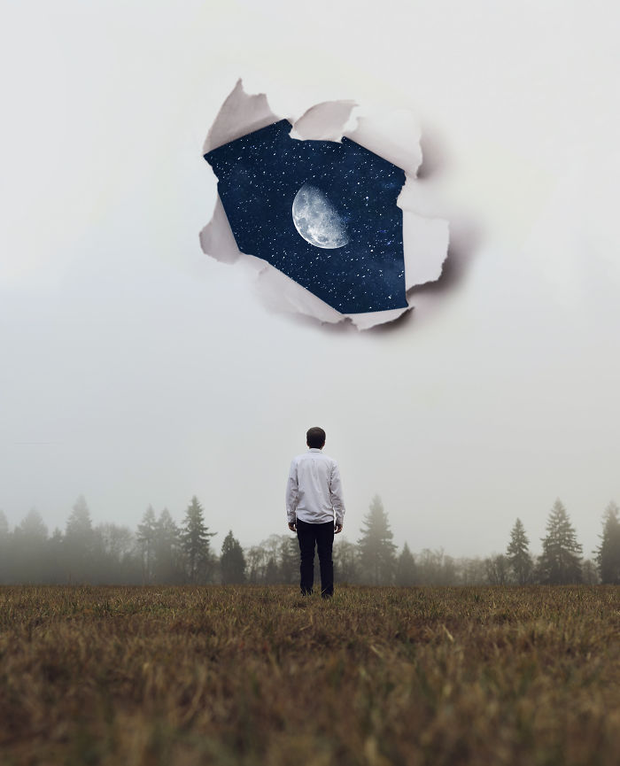 Man in field looking at a torn sky revealing the moon, creating a surreal, dreamlike atmosphere with visual metaphors.