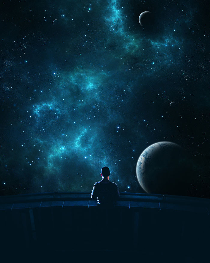 Man gazing at surreal, dreamlike galaxy with planets, embodying visual metaphors and unconventional atmospheres.