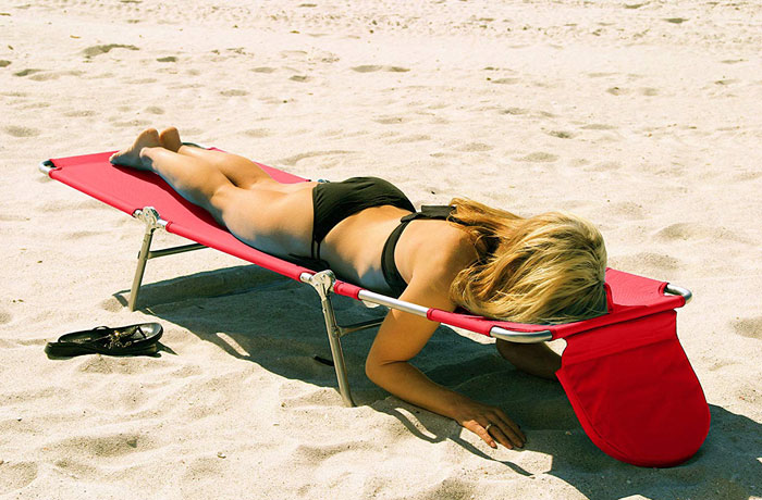 Amazon Is Selling A Beach Lounge Chair That Has A Face Hole For Reading