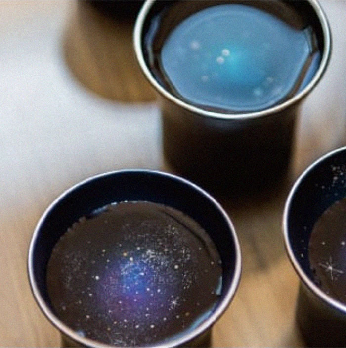 Clever Design Turns Ordinary Cups Into Liquid Galaxies When Something Is Poured Into Them