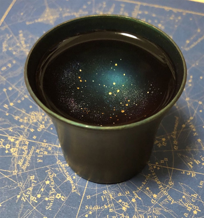 Clever Design Turns Ordinary Cups Into Liquid Galaxies When Something Is Poured Into Them