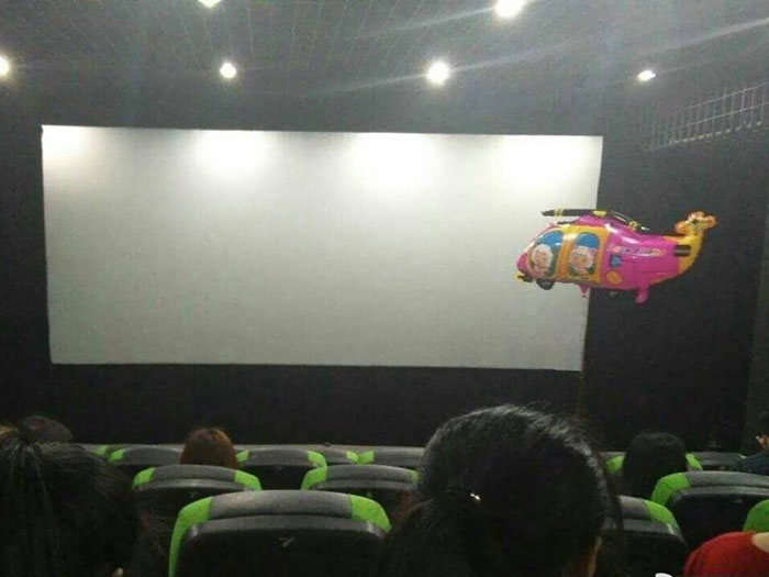 This Little Kid's Ballon In The Theatre
