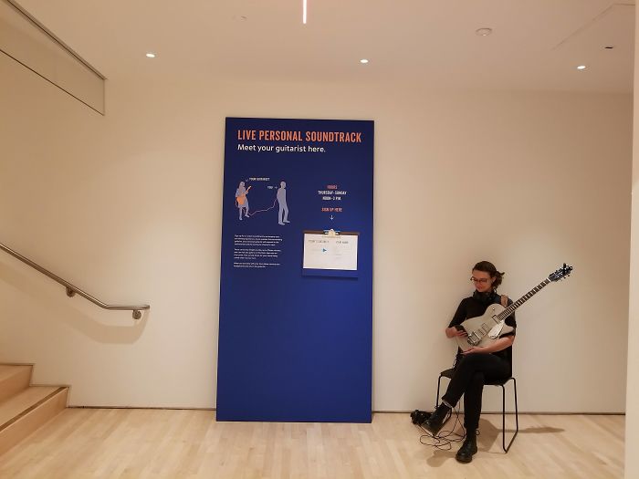 This Museum Has A Guitarist Who Will Follow You Around Playing Music