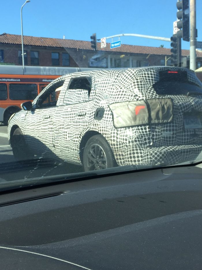 This Weird Wrapped Car. The Lights Were Wrapped In Cloth. Serial Numbers All Around. Anything Significant Or Just Tacky?