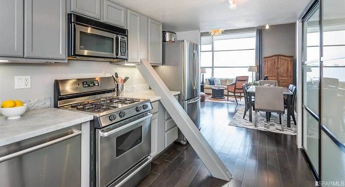 $1 Million San Francisco Loft Has Diagonal Support Beam That Cuts Through The Middle Of The Kitchen