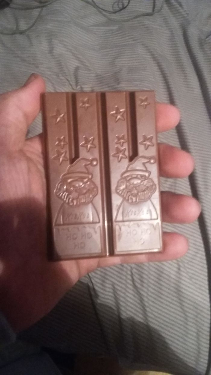 These Christmas Kit Kats. The Design Doesn't Let You Break Them, I Had To Eat Them Like A Neanderthal