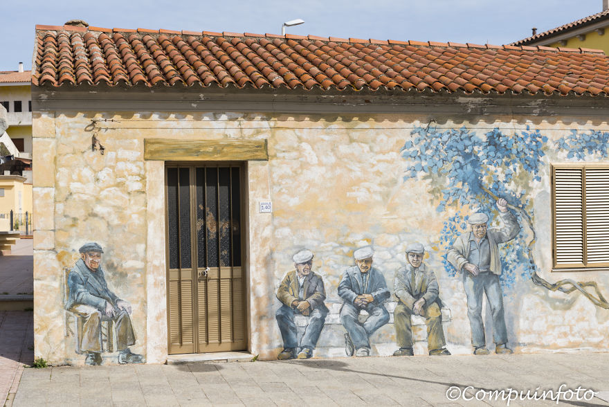 Sitting Man Murales In Orgosolo On The Italian Island Of Sardinia