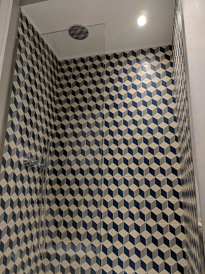 This Shower Has No Door. Water Gets All Over The Bathroom Anytime Someone Takes A Shower