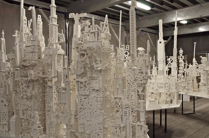 A City Is Being Built With White Lego Pieces And Everyone Can Join The Process