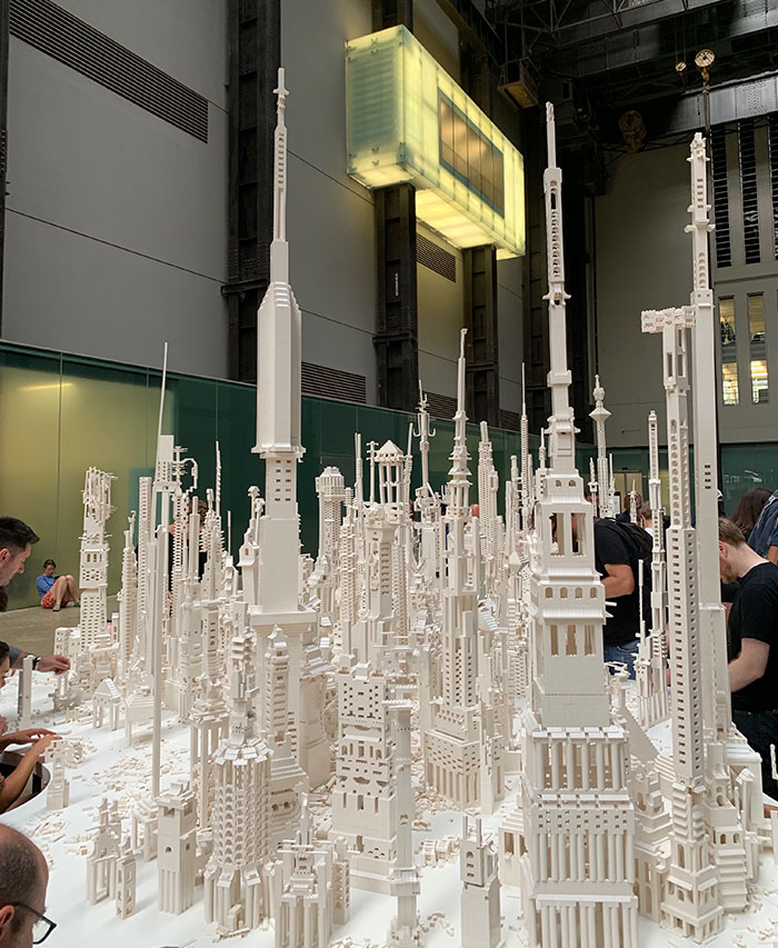 A City Is Being Built With White Lego Pieces And Everyone Can Join The Process