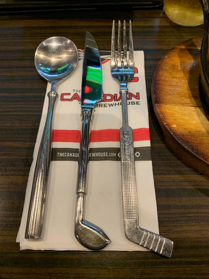 The Utensils At This Sports Bar Have Different Equipment As Handles. Spoons Are Baseball Bats, Knives Are Golf Clubs, And The Forks Are Hockey Sticks