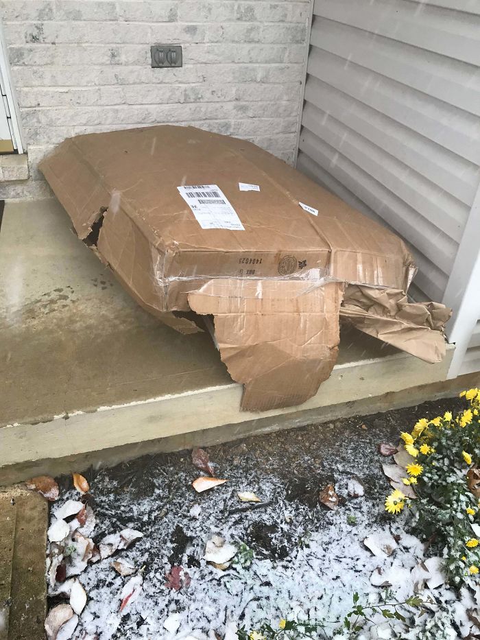 Package Of IKEA Shelves Delivered By FedEx Like This. Wife Even Watched The Guy Throw It Up Onto The Porch And Ripped It. Just Waved To Her And Left. 6 Shelf Pieces, Every Single One Damaged