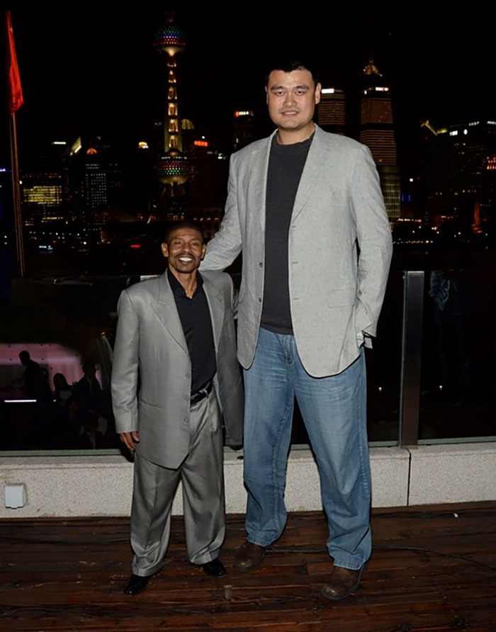 Yao Ming And Retired American Basketball Player Muggsy Bogues