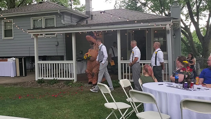 Maid Of Honor Crashes Her Sister's Wedding Dressed Up As A T-Rex