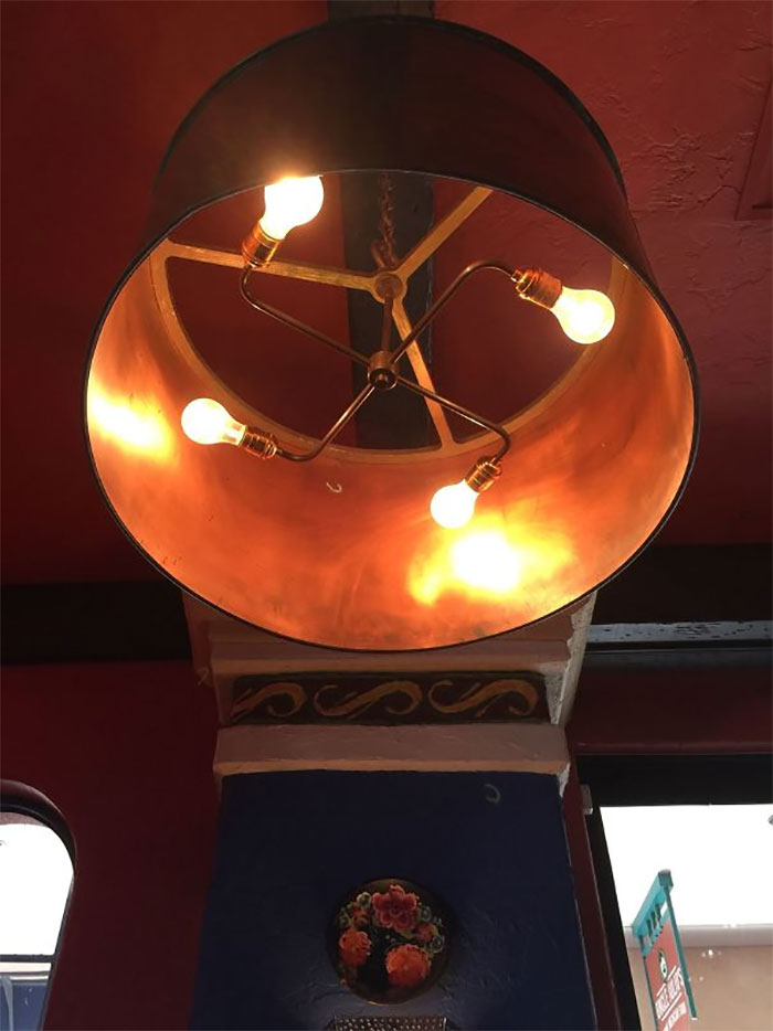 This Light I Found At A Restaurant Has A Swastika Hiding Inside It