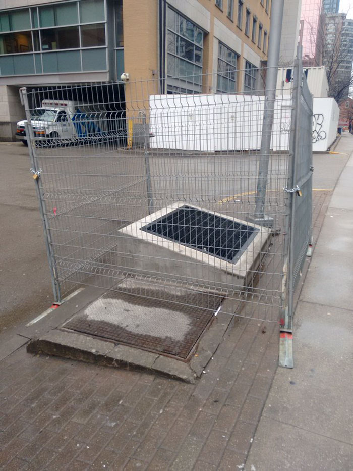 Flat Ventilation Grate Level With Ground; Homeless Slept On It For Warmth. A Few Months Ago The Grate Was Reno'd With A Slope