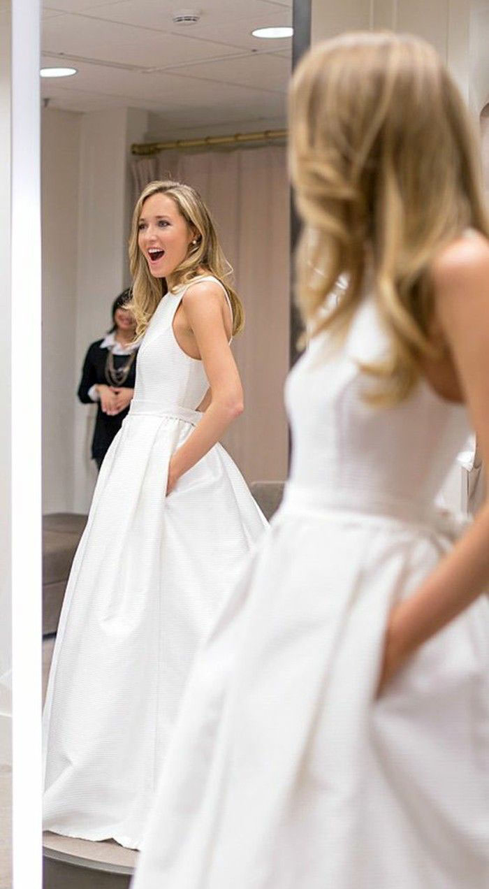 13 Times Brides Couldn't Hold Back Their Happiness Because They Wore Dresses With Pockets
