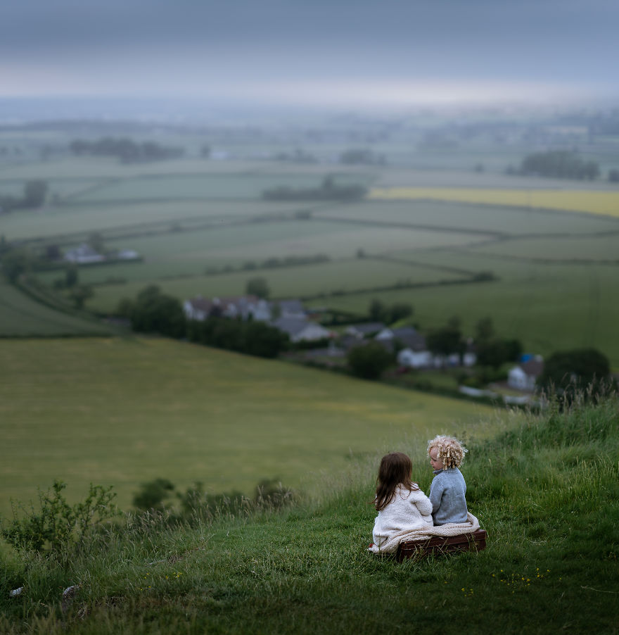 Portlaoise, Ireland- Kids Sitting Down And Taking And Beautiful View Of Irish Land