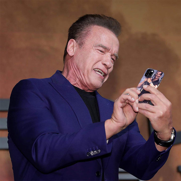 Someone Spots That Arnold Schwarzenegger Has The Funniest iPhone Case