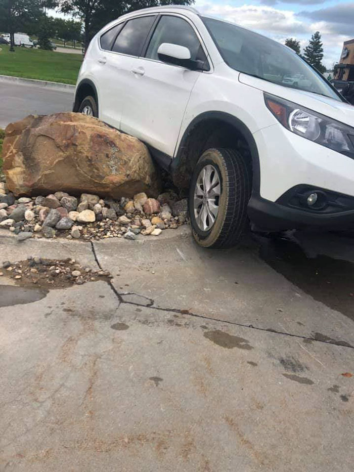 Someone Put Down A Huge Stone To Stop Curb Jumpers And Capture The Fools That Ignore It