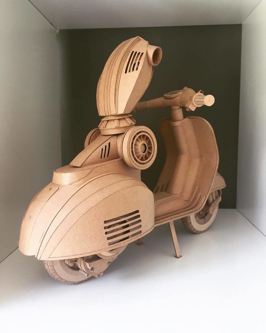 Back To Work After Xmas, Vesbot Rider Taking Shape, Arms And Head Next. Hope Everyone Had A Good Break. #vesbot #papersculpture #cardboardart #vespa #vespamodel #papercraft #paperart #paperwork #cardboardrobot