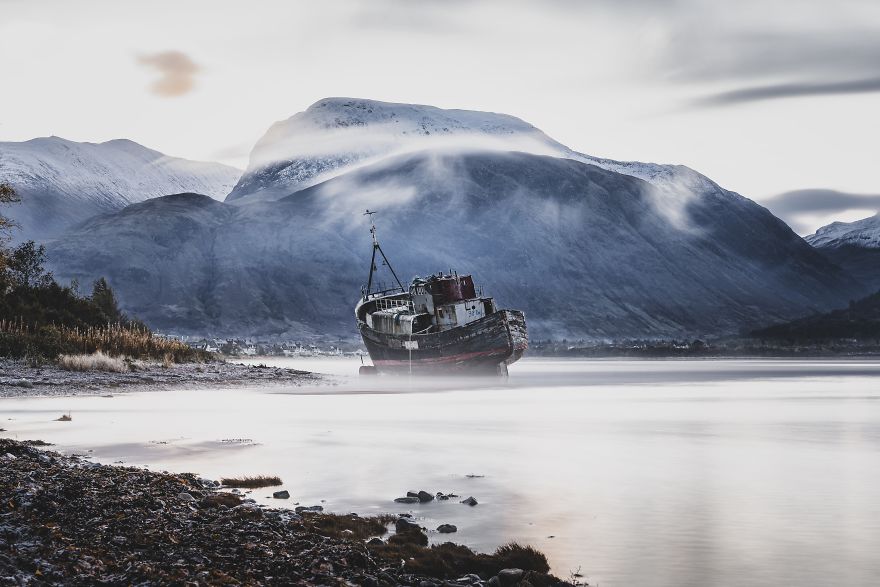 Abandoned Boat With The Backdrop Of The Highest Mountain In The UK