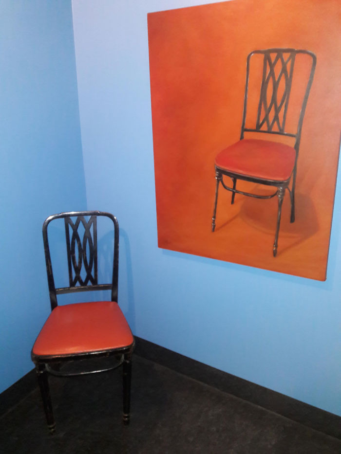 There Is A Painting Of This Chair In The Bathroom