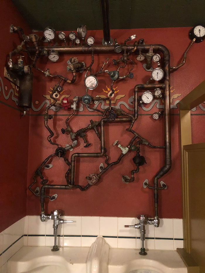 The Exposed Plumbing Of This Bathroom (And Yes, All The Gauges Work)