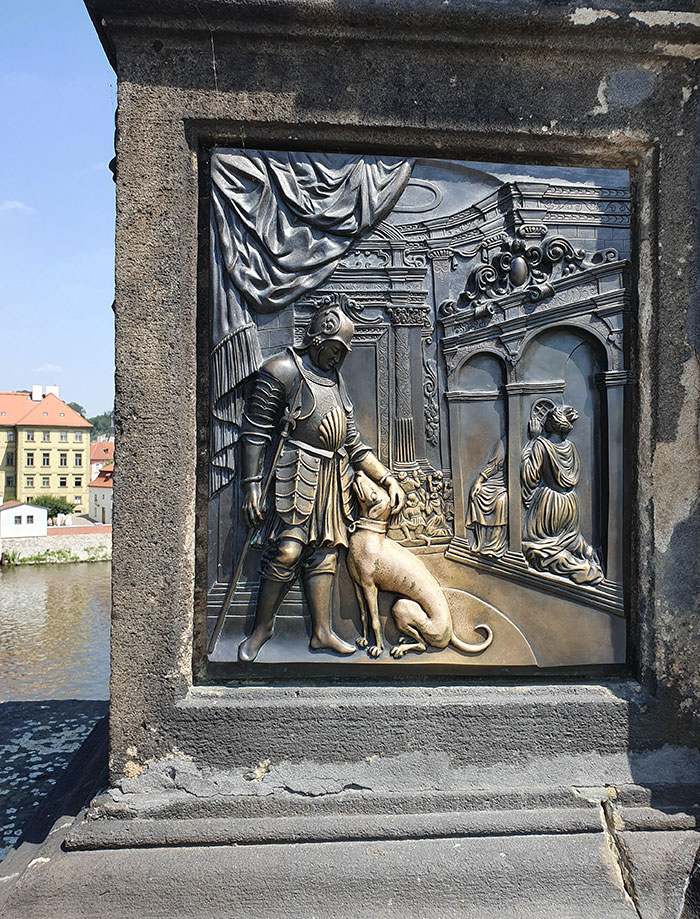 The Way That The Statue Has Been Worn By People Stroking The Dog On The Charles Bridge