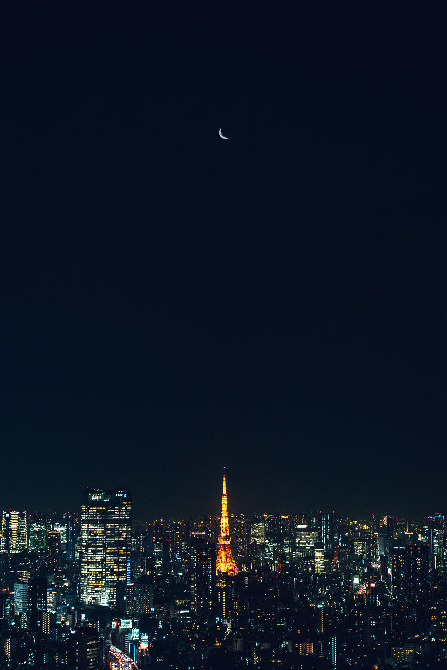 Tokyo Tower And The Crescent Moon Reflected In The Glass