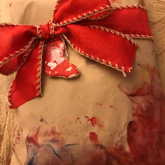 When You Have Your Kid Paint Wrapping Paper But It Ends Up Looking Like You Murdered The UPS Guy And Stole His Packages