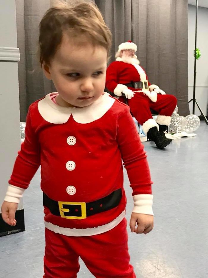 We Dressed Up Our 18 Month Old Daughter To See Santa. She Was Not Pleased