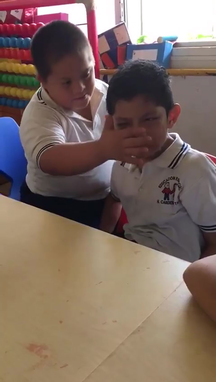Video Of Boy With Down’s Syndrome Comforting Classmate With Autism Goes Viral For The Right Reasons