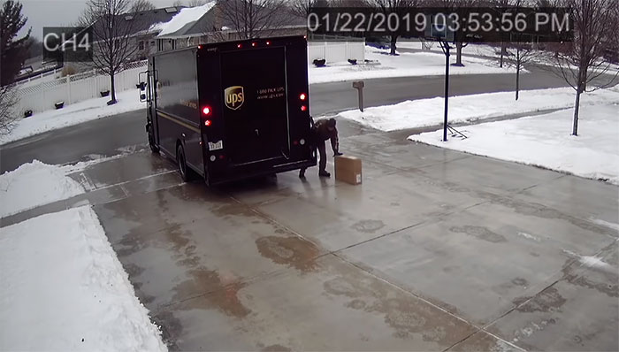 A Security Cam Captures This UPS Delivery Guy Being A Hero And Doing His Best To Deliver What He Has To