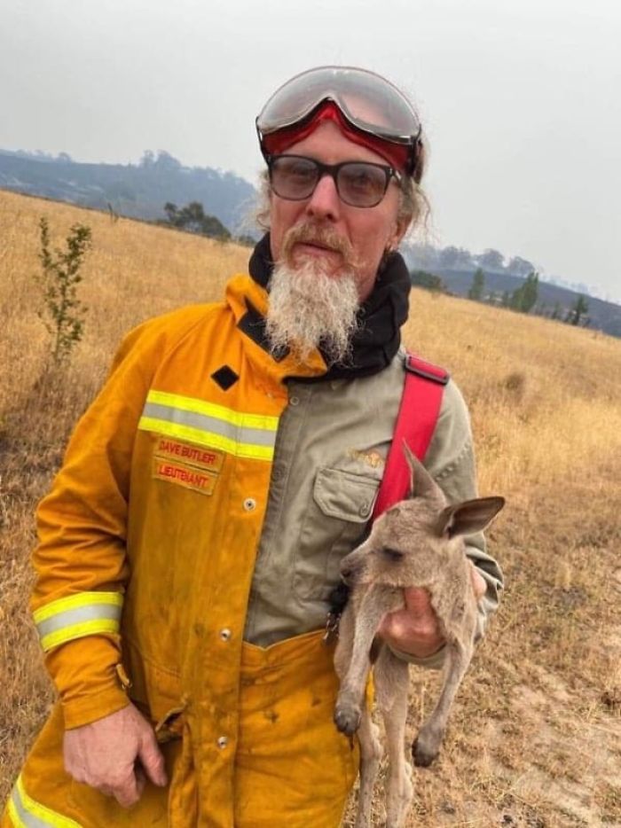 Picture Of My Cousin Who Is Fighting The Fires In Victoria Saved This Joey