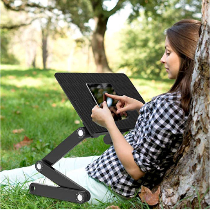 This Laptop Stand That Is Very Poorly Photoshopped In And Not Even Being Used
