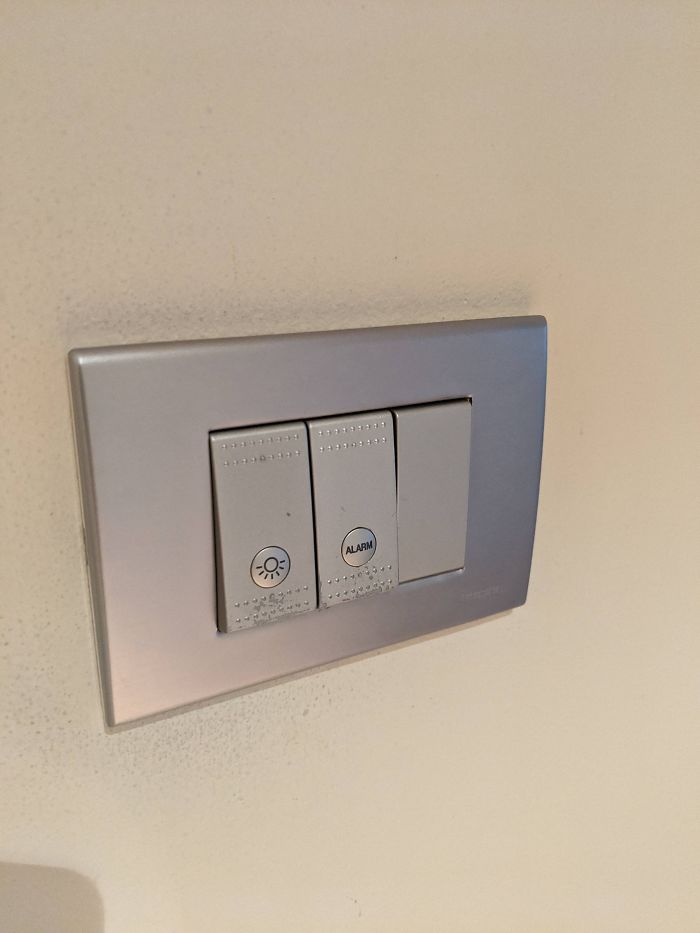 This Alarm Which Looks And Feels Just Like The Light Switch Directly Next To It