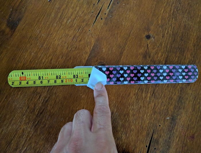 The Inside Of My Daughter's Snap Bracelet Is From A Tape Measure