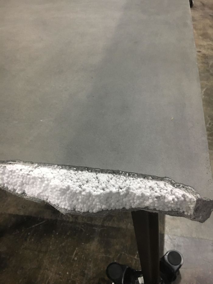 The Inside Of This Broken Concrete Table Is Full Of Styrofoam