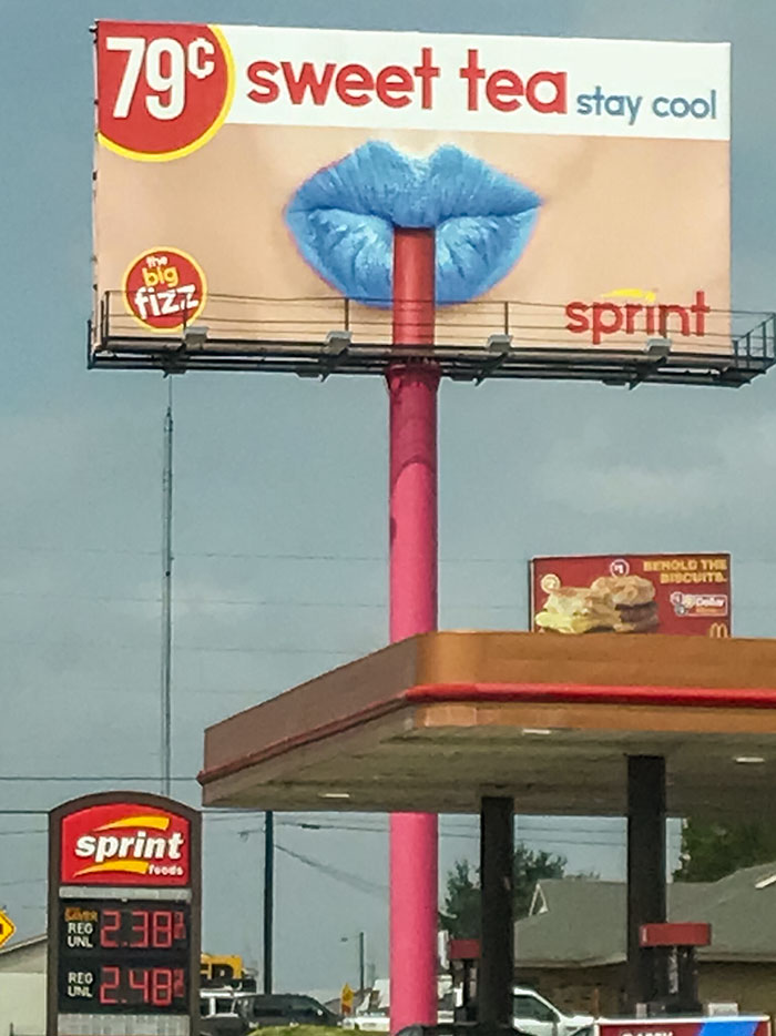 The Way This Billboard Uses Its Pole To Make A Really Big Straw