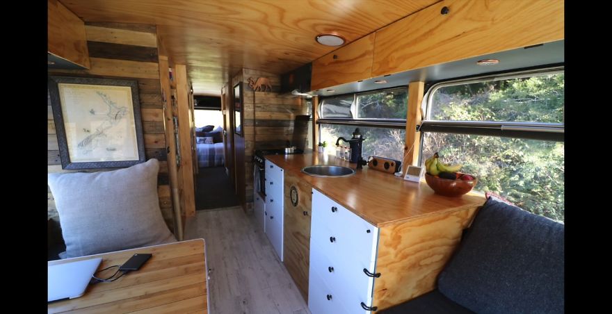 This Inspiring Couple Quit Their 9-5 Jobs To Live & Travel In A DIY Off-Grid School Bus Conversion